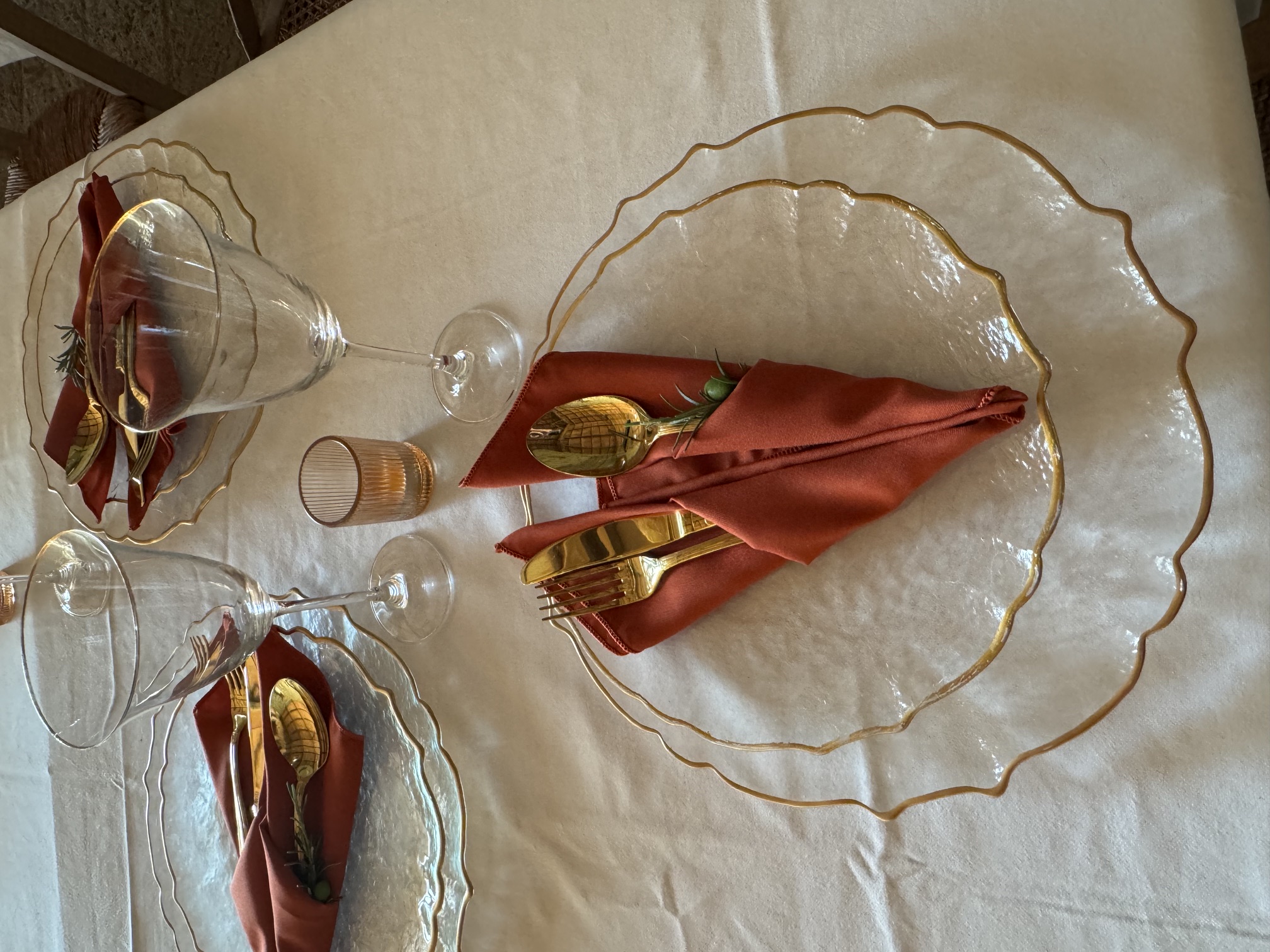 Elegant table setting with gold flatware